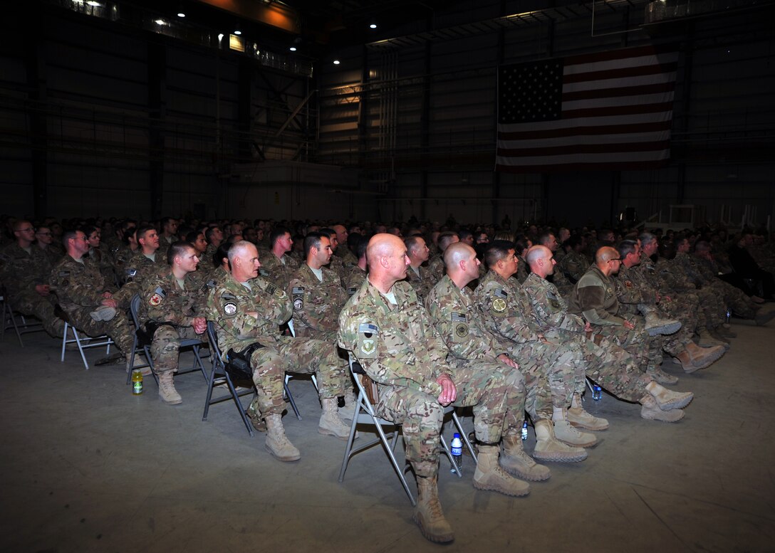 U.S. Air Force Airmen listen attentively as U.S. Air Force Chief of Staff Gen. Mark A. Welsh III thanks them for their service during an all-call Dec. 15, 2014 at Bagram Airfield, Afghanistan. The all-call included a Q-and-A session with the general fielding questions from Airmen about what was on their minds. (U.S. Air Force photo by Staff Sgt. Whitney Amstutz/released)