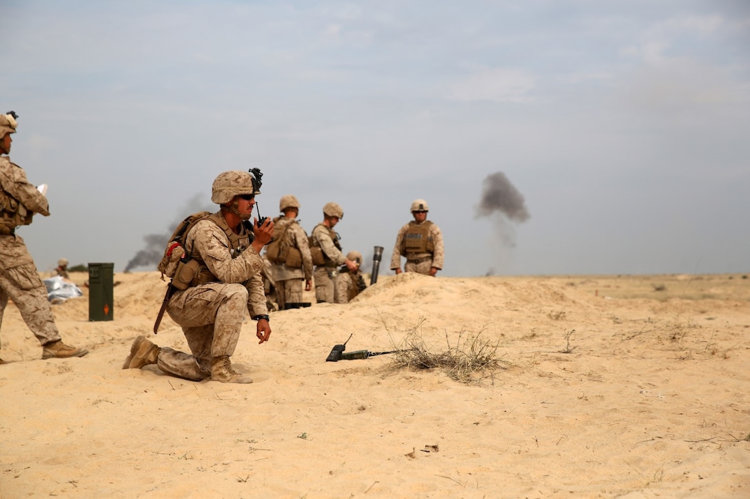 U.S. Marine Corps 1st Lt. Corey R. Moyer, a platoon commander with Weapons Company, Battalion Landing Team, 2nd Battalion, 1st Marines, 11th Marine Expeditionary Unit, and native of Freedom, Pa., direct his platoon as they execute the final exercise of Red Reef 15 in Ras Al Khair, Saudi Arabia. Red Reef is part of a routine theater security cooperation engagement plan and serves as an excellent opportunity to strengthen tactical proficiency in critical mission areas and support long-term regional security. (U.S. Marine Corps photo by Cpl. Evan R. White/Released)