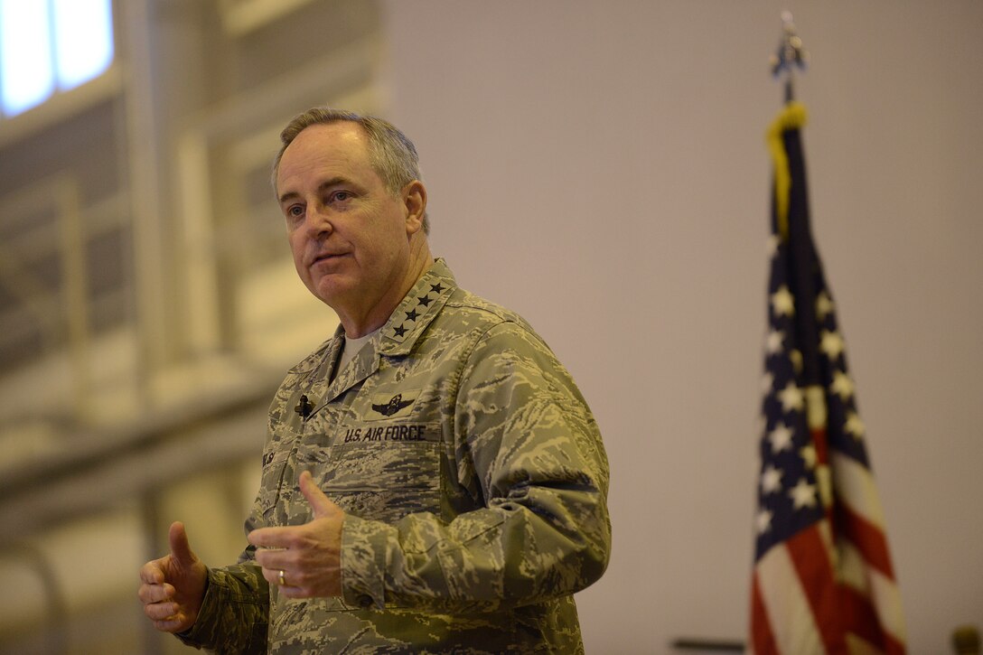 Air Force Chief of Staff Gen. Mark A. Welsh III addresses Aviano Air Base Airmen during an all call Dec. 22, 2014, at Aviano AB, Italy. Among the topics discussed during the all call were force shaping, fleet modernization and renewing an operational focus in the face of persisting fiscal austerity. (U.S. Air Force photo/Staff Sgt. Evelyn Chavez)