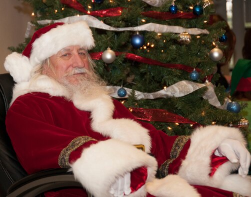 Santa Claus poses for the camera Dec. 13 during the wing’s annual Operation Holiday Open House. (U.S. Air National Guard photo by Staff Sgt. Gregory Ferreira/Released)