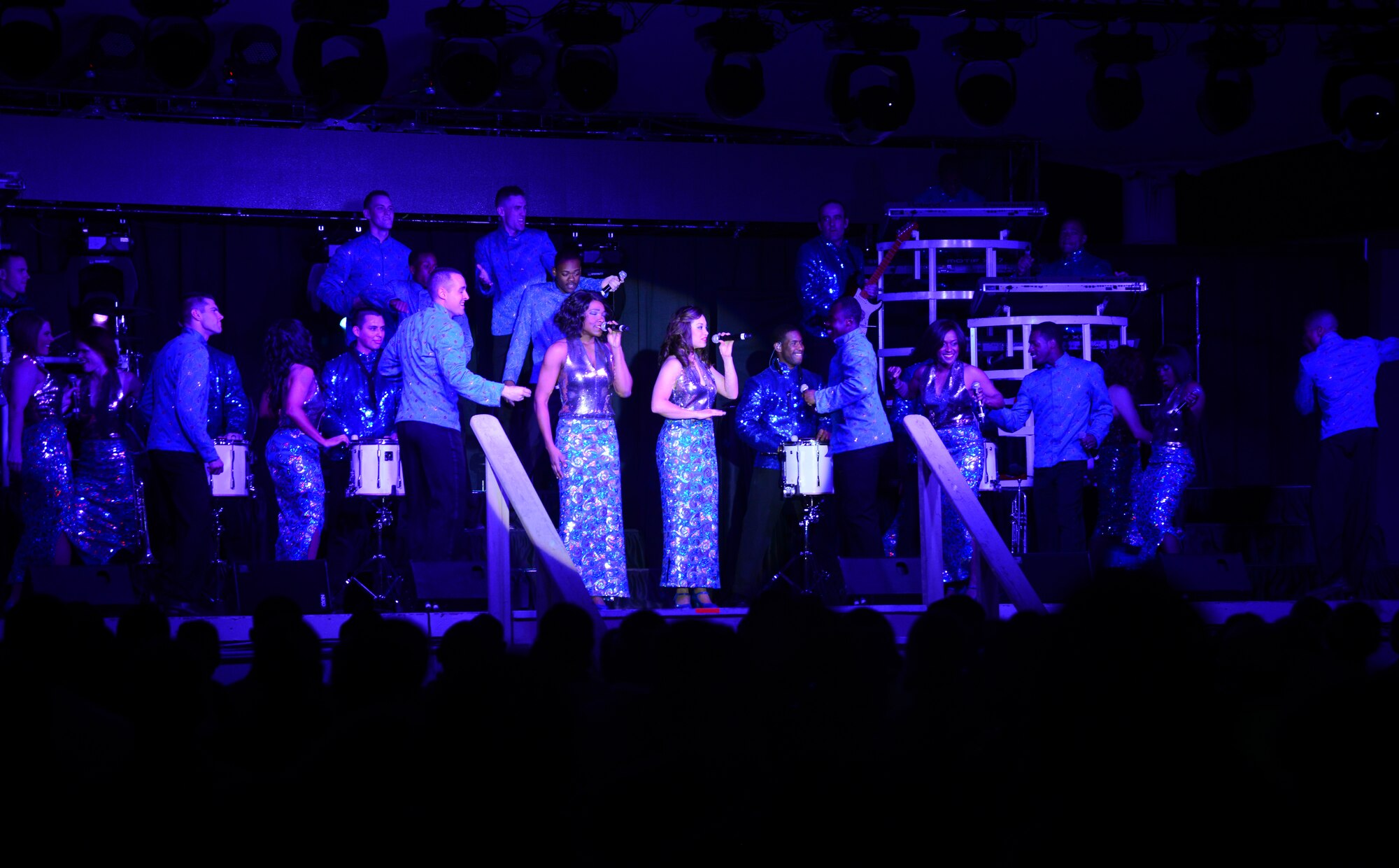 Airmen from Tops in Blue, the Air Force’s premiere entertainment showcase, perform for deployed U.S. servicemembers, Dec. 23, 2014, at Al Udeid Air Base, Qatar.  Tops in Blue visited Al Udeid as part of their 2014 world tour, which provides music, song and dance to audiences in more than 85 locations.  For 60 years, Tops in Blue has provided the military community and public with world-wide performances. (U.S. Air Force photo by Senior Airman Kia Atkins)