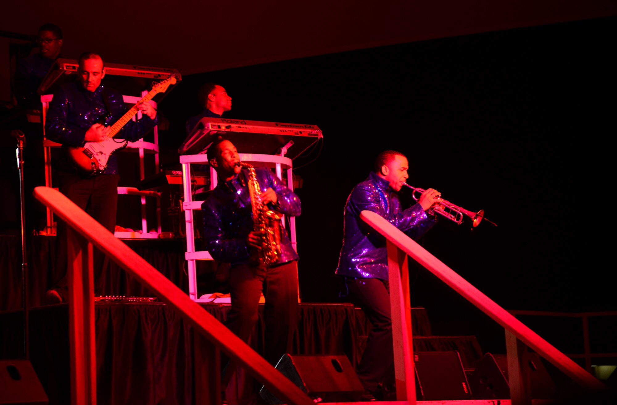 Airmen from Tops in Blue, the Air Force’s premiere entertainment showcase, perform for deployed U.S. servicemembers, Dec. 23, 2014, at Al Udeid Air Base, Qatar.  Tops in Blue visited Al Udeid as part of their 2014 world tour, which provides music, song and dance to audiences in more than 85 locations.  For 60 years, Tops in Blue has provided the military community and public with world-wide performances. (U.S. Air Force photo by Senior Airman Kia Atkins)