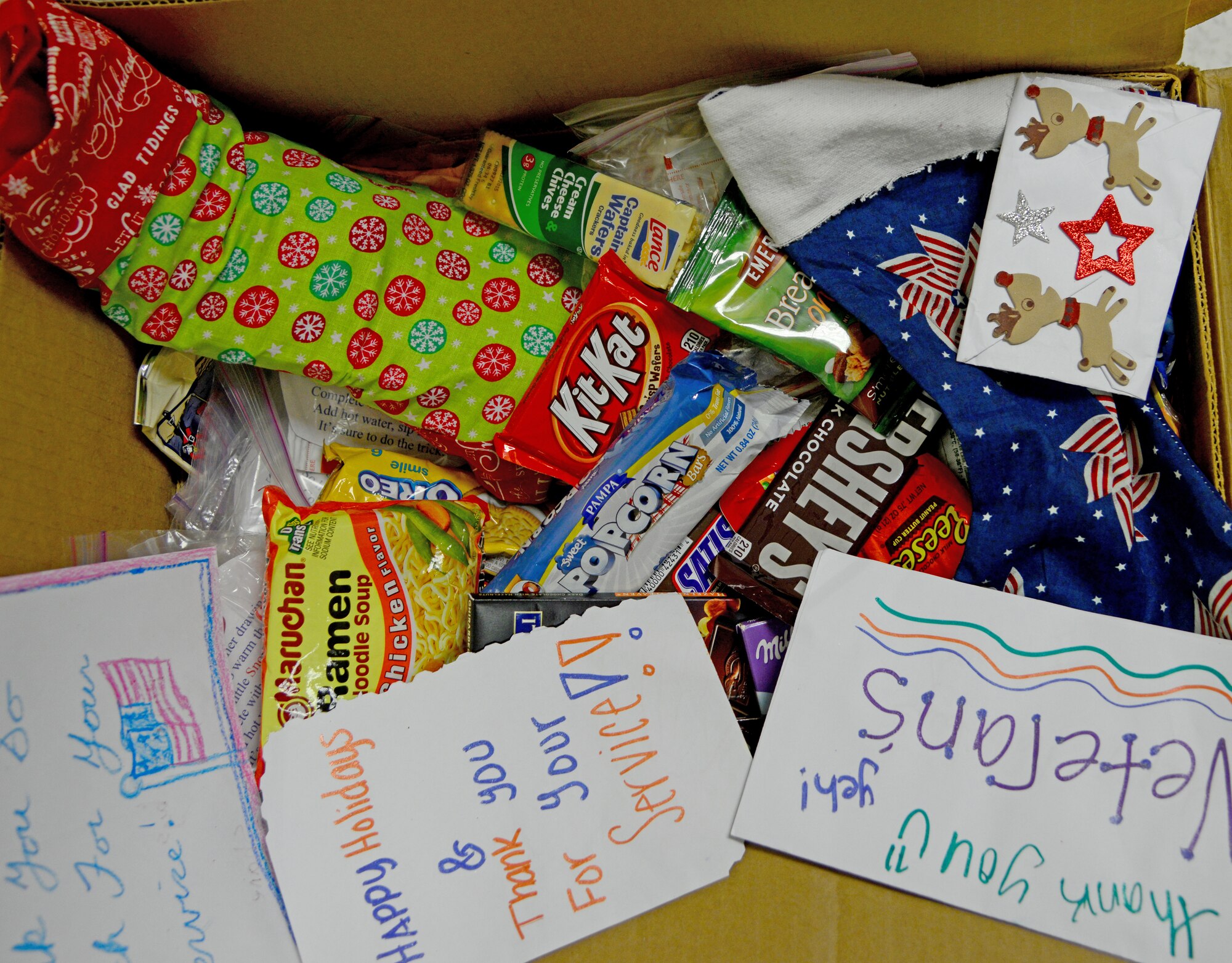 Care packages are often stuffed with much needed toiletries, as well as, homemade cookies, candy and holiday cards thanking servicemembers for their sacrifice and service to their country. (U.S. Air Force photo by Senior Airman Kia Atkins)