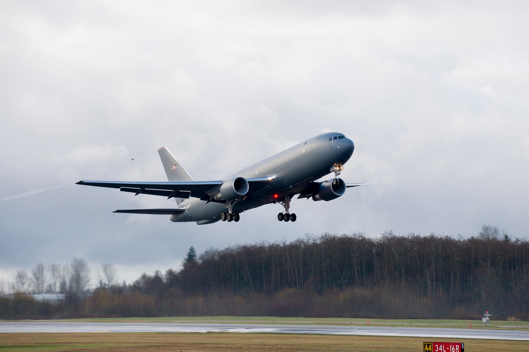 The KC-46 Pegasus development program completed its first flight of Engineering, Manufacturing and Development (EMD) aircraft #1 Dec. 28, 2014. The maiden flight took off at 9:29 AM PST from Paine Field in Everett, Washington, and landed at 1:01 PM PST at Boeing Field in Seattle.EMD #1 is a provisioned 767-2C freighter and the critical building block for the KC-46 missionized aerial refueler.  