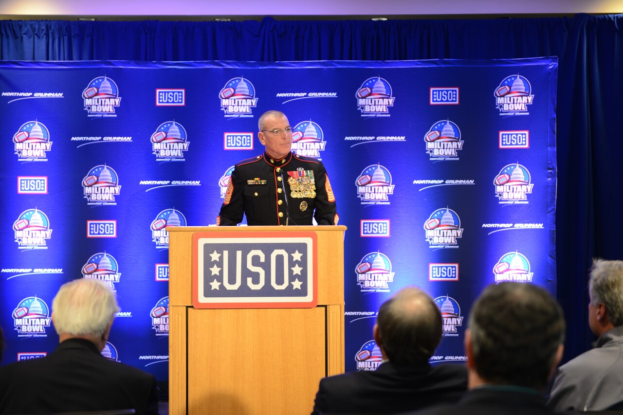 Marine Corps Sgt. Maj. Bryan B. Battaglia, senior enlisted advisor to the chairman of the Joint Chiefs of Staff, speaks during a USO reception at Navy-Marine Corps Stadium in Annapolis, Md., Dec. 27. Battaglia participated in pre-game festivities for the 2014 Military Bowl. DoD photo by Sgt. 1st Class Tyrone C. Marshall Jr.