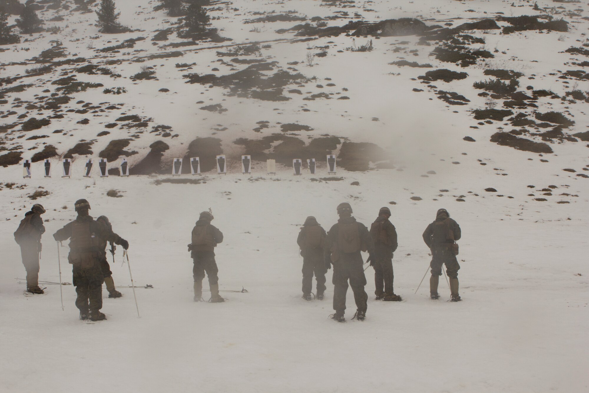 U.S. Marines with SPMAGTF Crisis Response – Africa, learn proper the proper technics of shooting in show taught by a Spanish mountaineer with 1st Mountain Troops Command IOT during mountain warfare training in Candanchu, Spain, Dec. 16, 2014. The exercise, which was conducted with the Spanish, allowed the Marines to gain greater knowledge of mountain warfare tactics, techniques and procedures while enhancing interoperability with the Spanish and strengthening the U.S. partnership with Spain.  SPMAGTF-CR-AF is a self-mobile crisis response force that conducts missions to protect U.S. personnel, property, and interests in the U.S. Africa Command area of responsibility. (U.S. Marine Corps photo by Cpl. Jeraco Jenkins/Released)