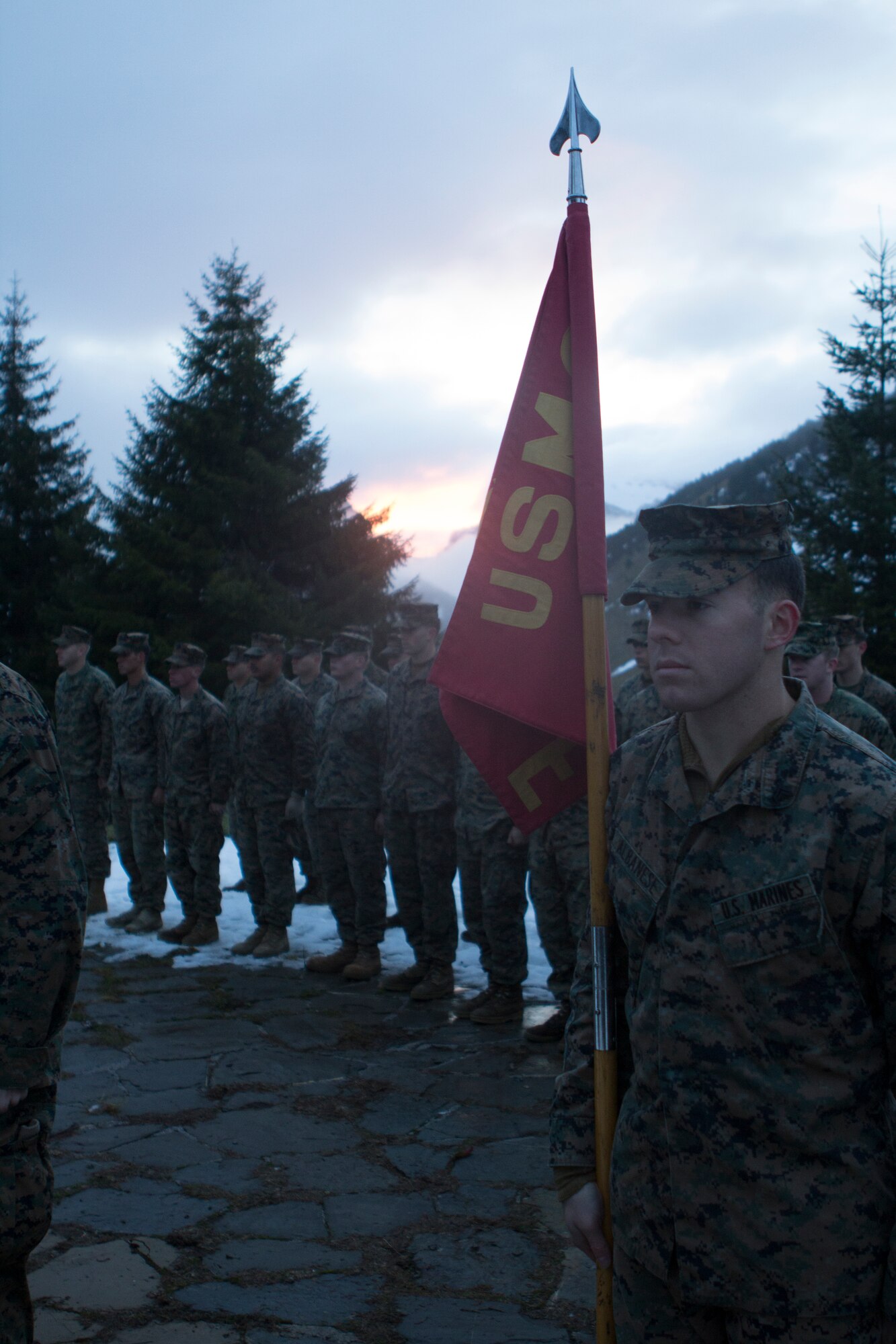 U.S. Marines with SPMAGTF Crisis Response – Africa, stand in formation during mountain warfare training in Candanchu, Spain, Dec. 16, 2014. The exercise, which was conducted with the Spanish, allowed the Marines to gain greater knowledge of mountain warfare tactics, techniques and procedures while enhancing interoperability with the Spanish and strengthening the U.S. partnership with Spain.  SPMAGTF-CR-AF is a self-mobile crisis response force that conducts missions to protect U.S. personnel, property, and interests in the U.S. Africa Command area of responsibility. (U.S. Marine Corps photo by Cpl. Jeraco Jenkins/Released)
