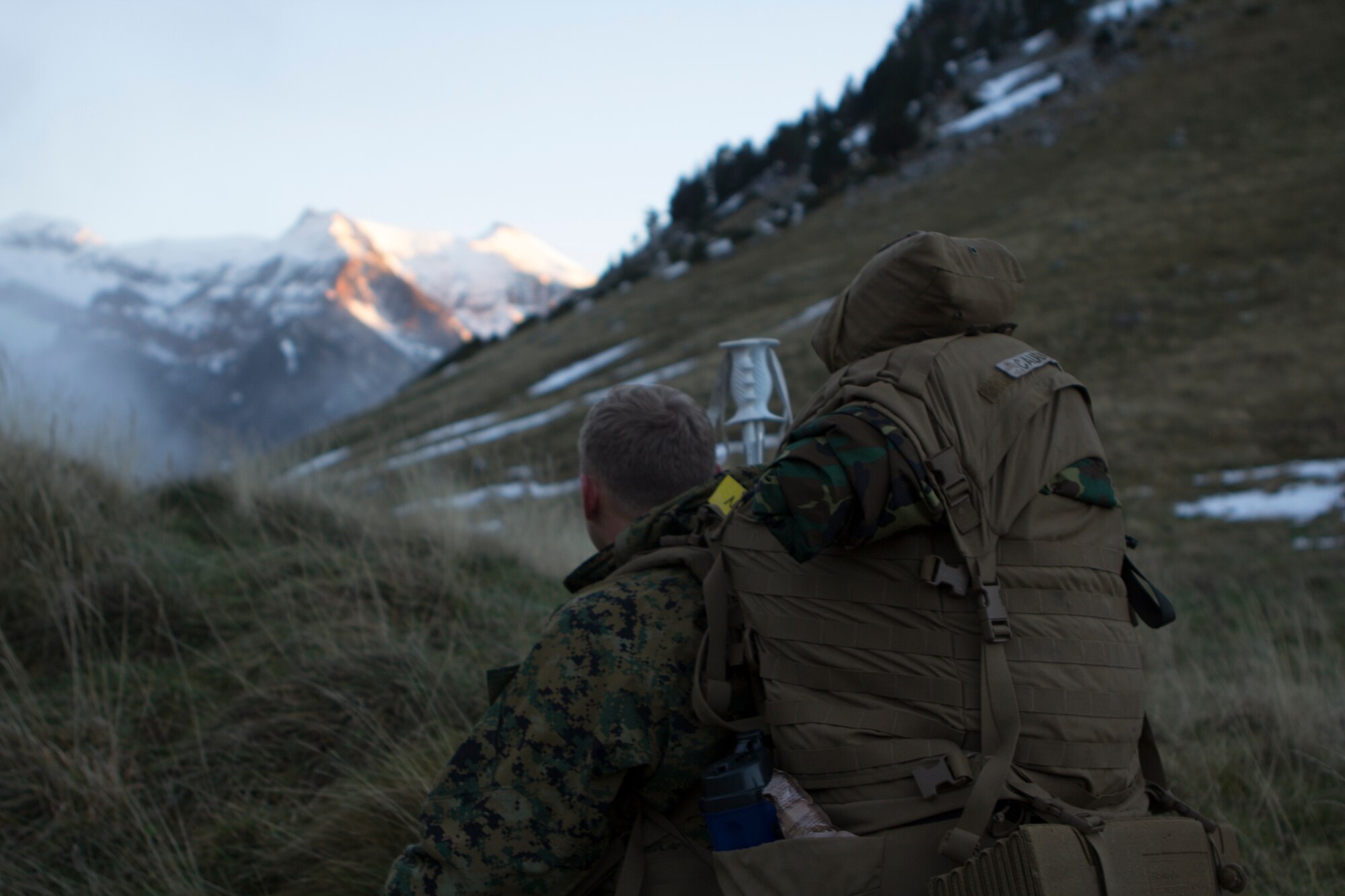 U.S. Marine Cpl. David S. Caudill, a rifleman with SPMAGTF Crisis Response – Africa, conducts a trail reconnaissance during mountain warfare training in Candanchu, Spain, Dec. 16, 2014. The exercise, which was conducted with the Spanish, allowed the Marines to gain greater knowledge of mountain warfare tactics, techniques and procedures while enhancing interoperability with the Spanish and strengthening the U.S. partnership with Spain.  SPMAGTF-CR-AF is a self-mobile crisis response force that conducts missions to protect U.S. personnel, property, and interests in the U.S. Africa Command area of responsibility. (U.S. Marine Corps photo by Cpl. Jeraco Jenkins/Released)