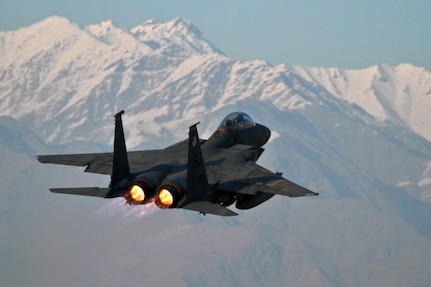 A U.S. Air Force F-15E Strike Eagle from the 335th Expeditionary Fighter Squadron takes off from Bagram Air Field, Afghanistan, Dec. 21, 2011. President Barack Obama and Defense Secretary Chuck Hagel made remarks Dec. 28, 2014, about the combat mission's conclusion in Afghanistan.