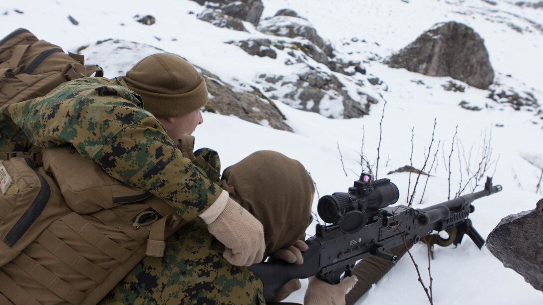 U.S. Marine Lance Cpl. Joseph T. Rose and Cpl. David S. Caudill, rifleman with Special Purpose Marine Air-Ground Task Force Crisis Response – Africa, set up a defensive position with an M-240B medium machine-gun in snow during mountain warfare training in Candanchu, Spain, Dec. 16, 2014. The exercise, which was conducted with the Spanish, allowed the Marines to gain greater knowledge of mountain warfare tactics, techniques and procedures while enhancing interoperability with the Spanish and strengthening the U.S. partnership with Spain.  SPMAGTF-CR-AF is a self-mobile crisis response force that conducts missions to protect U.S. personnel, property and interests in the U.S. Africa Command area of responsibility. 
