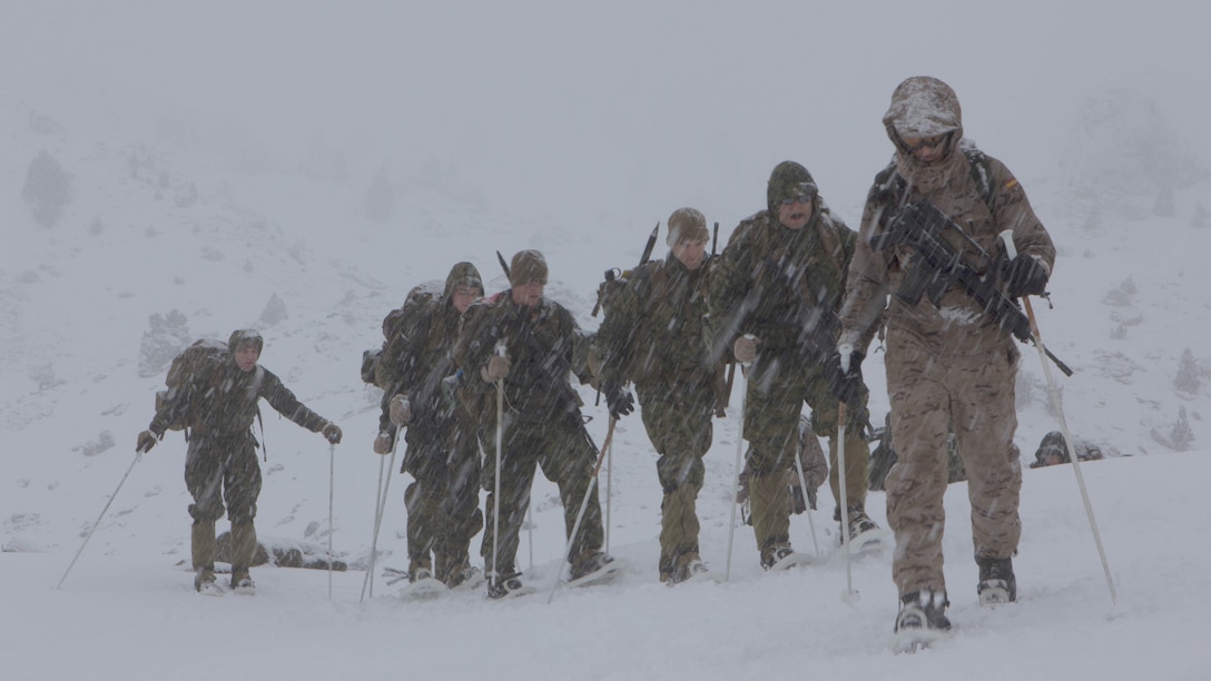 U.S. Marines with Special Purpose Marine Air-Ground Task Force  Crisis Response – Africa, are guided by a Spanish Army mountaineer with 1st Mountain Troops Command, on a hike during mountain warfare training in Candanchu, Spain, Dec. 16, 2014. The exercise, which was conducted with the Spanish, allowed the Marines to gain greater knowledge of mountain warfare tactics, techniques and procedures while enhancing interoperability with the Spanish and strengthening the U.S. partnership with Spain. SPMAGTF-CR-AF is a self-mobile crisis response force that conducts missions to protect U.S. personnel, property, and interests in the U.S. Africa Command area of responsibility.