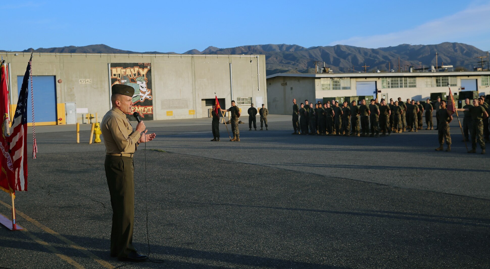 Major Gen. Vincent Coglianese, commanding general 1st Marine Logistics Group, talks to Marines with 1st Maintenance Battalion, Combat Logistics Regiment 15, 1st MLG, during an award ceremony aboard Camp Pendleton, California, Dec. 19, 2014. (Marine Corps photo by Cpl. Cody Haas/ Released)