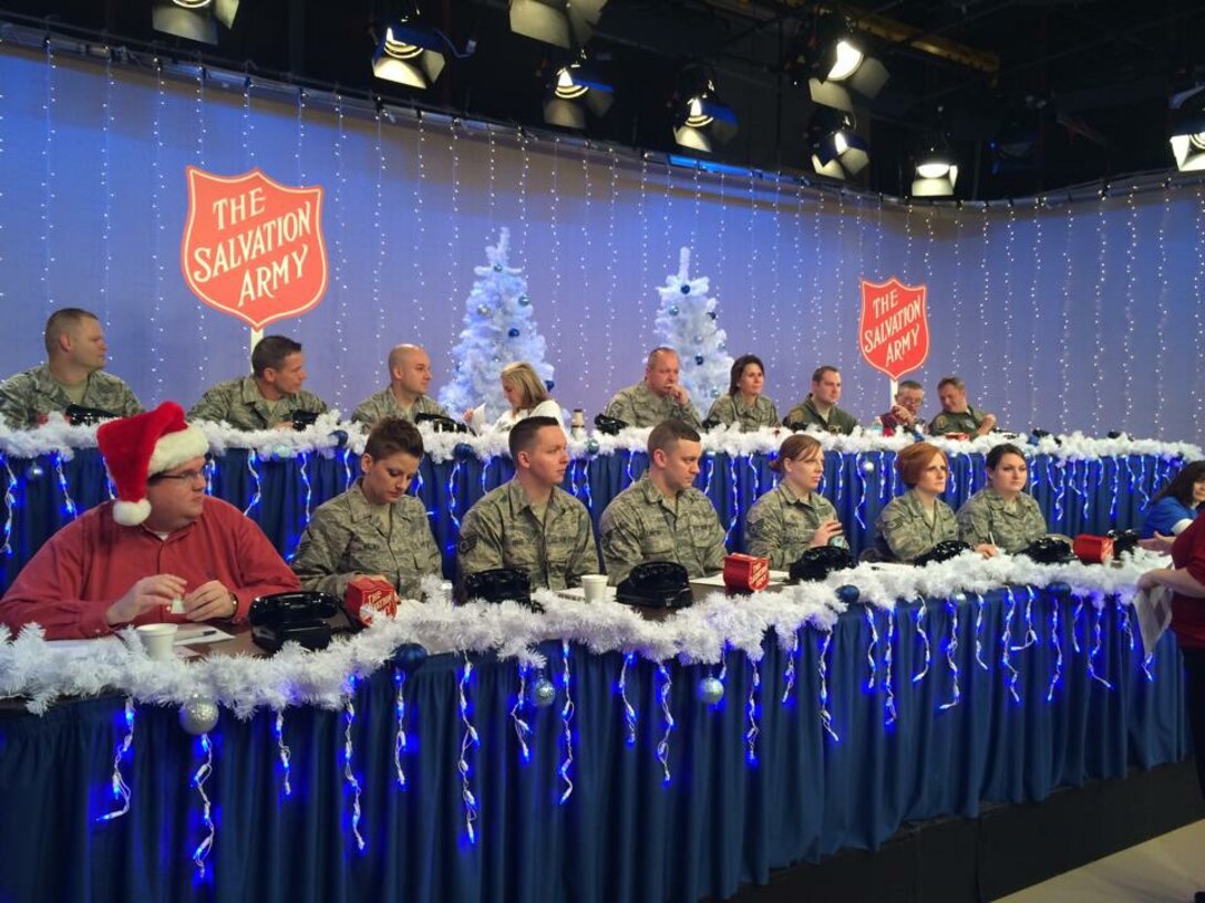 Members of the 171st Air Refueling Wing volunteered to take pledges from a phone bank for WTAE-TV's Project Bundle-Up Telethon Dec. 05, 2014. Project Bundle-Up is a joint partnership with The Salvation Army of Western Pennsylvania that raises money to provide winter outerwear to local children and senior citizens. (U.S. Air National Guard Photo/Released)