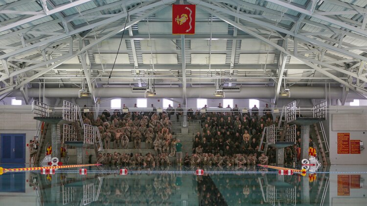 Recruits of Bravo Company, 1st Recruit Training Battalion, receive a brief on the Water Survival Basic Qualification at Marine Corps Recruit Depot San Diego, Dec. 15.  Marine Corps Instructors of Water Survival give in-depth classes and demonstrations to recruits to ensure their success during the swim qualification events.