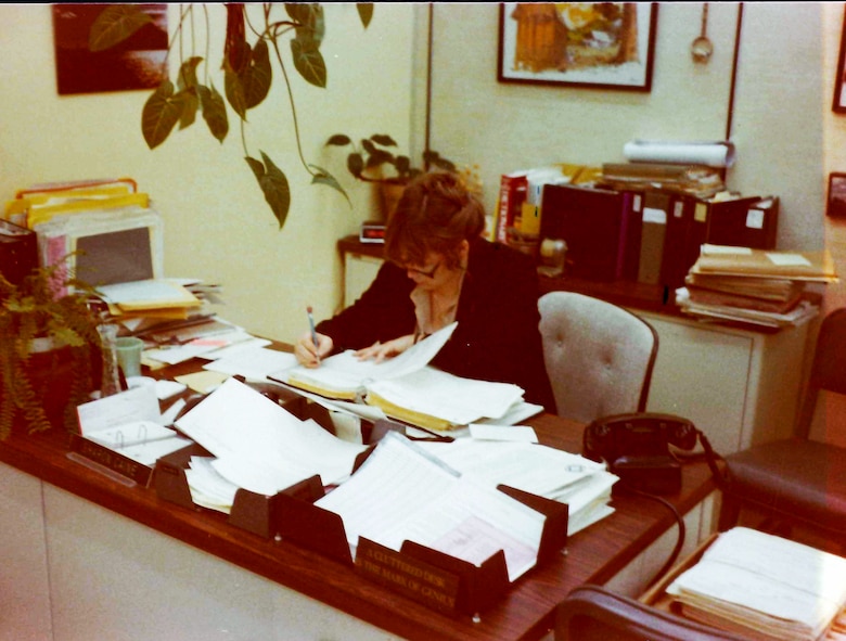 Sharon Caine, U.S. Army Corps of Engineers Sacramento District real estate division chief, is pictured working at her desk in the 1980s when she was a section chief in the real estate branch. Caine will retire at the end of 2014 after serving the U.S. Army Corps of Engineers for 54 years. Most of that time was spent with the Corps’ Sacramento District. 
