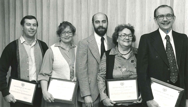 Sharon Caine (second from left), U.S. Army Corps of Engineers Sacramento District real estate division chief, stands with other district employees after receiving awards from the district commander in the 1970s. Caine will retire at the end of 2014 after serving the U.S. Army Corps of Engineers for 54 years. Most of that time was spent with the Corps’ Sacramento District. 