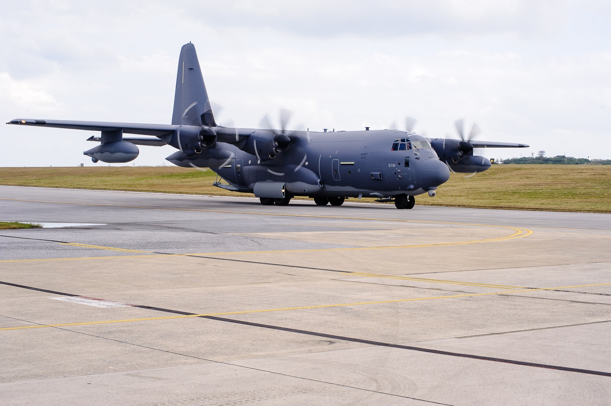 An MC-130J Commando II taxis on the flightline of Kadena Air Base, Japan, Dec. 21, 2014. The MC-130J will replace the MC-130P Combat Shadow aircraft assigned to the 353rd Special Operations Group’s 17th Special Operations Squadron. (U.S. Air Force photo by Tech. Sgt. Alexy Saltekoff)
