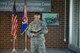 MCGHEE TYSON AIR NATIONAL GUARD BASE, Tenn. - Senior Master Sgt. Paul Butts reads from a book during his farewell and award ceremony in Patriot Hall here August 25, 2014, after serving as the I.G. Brown Training and Education Center's director of operations. (U.S. Air National Guard photo by Master Sgt. Jerry Harlan/Released)
