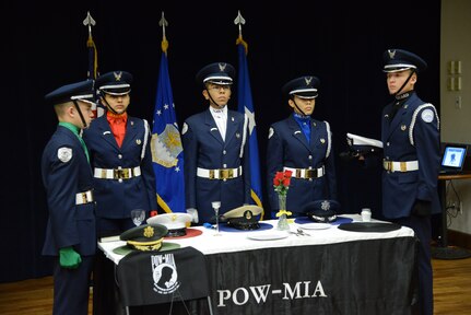 San Marcos High School, Air Force Junior ROTC members, participate in a Prisoner of War and Missing in Action ceremony, Nov. 4, during the Combat Breakfast at Joint Base San Antonio-Randolph.  This annual breakfast features a moving tribute to the wounded service men and women who have put themselves in harms way in defense of the freedom of our great nation.  (U.S. Air Force photo by Joel Martinez)