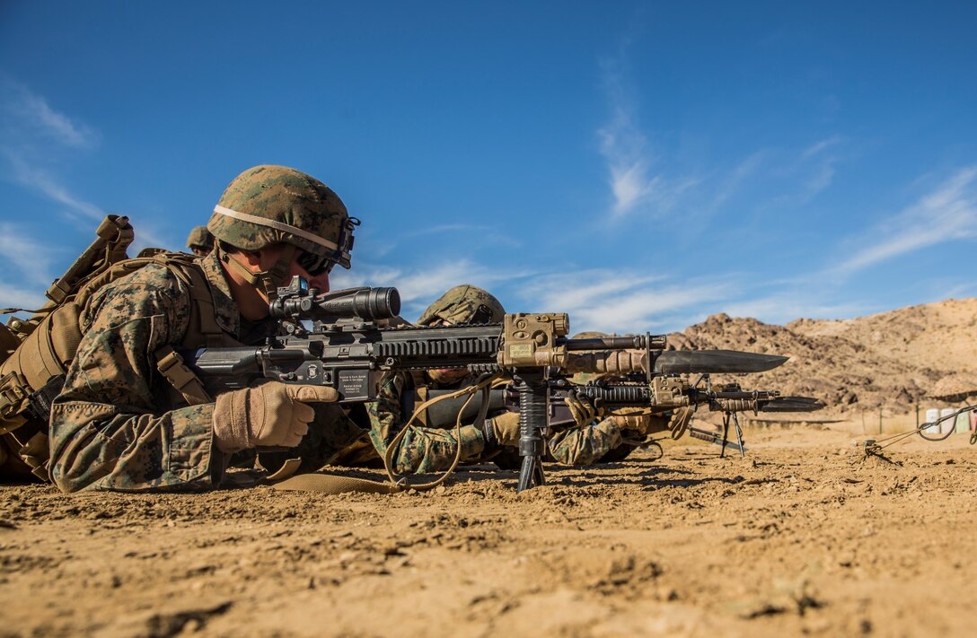 U.S. Marines with Battalion Landing Team 3rd Battalion, 1st Marine Regiment, 15th Marine Expeditionary Unit, conduct marksmanship drills during a combined arms exercise aboard Marine Corps Air Ground Combat Center, Twentynine Palms, Calif., Dec. 10, 2014. BLT 3/1 conducted this training concurrent with the 15th MEU’s realistic urban training.  RUT prepares the 15th MEU’s Marines for their upcoming deployment, enhancing their combat skills in environments similar to those they may find in future missions. (U.S. Marine Corps Photo by Sgt. Emmanuel Ramos/Released)