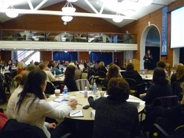 Participants in the Women in STEM conference listen to one of the many presentations that occurred during the event.