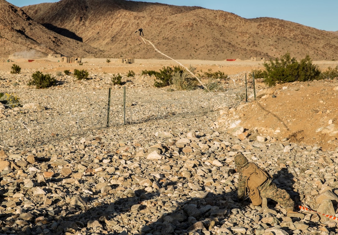 U.S. Marine Lance Cpl. Justin Saalfeld clears a lane during a combined arms exercise aboard Marine Corps Air Ground Combat Center, Twentynine Palms, Calif., Dec. 12, 2014. Saalfeld is an assaultman with Battalion Landing Team 3rd Battalion, 1st Marine Regiment, 15th Marine Expeditionary Unit. BLT 3/1 conducted this training concurrent with the 15th MEU’s realistic urban training.  RUT prepares the 15th MEU’s Marines for their upcoming deployment, enhancing their combat skills in environments similar to those they may find in future missions. (U.S. Marine Corps Photo by Sgt. Emmanuel Ramos/Released)