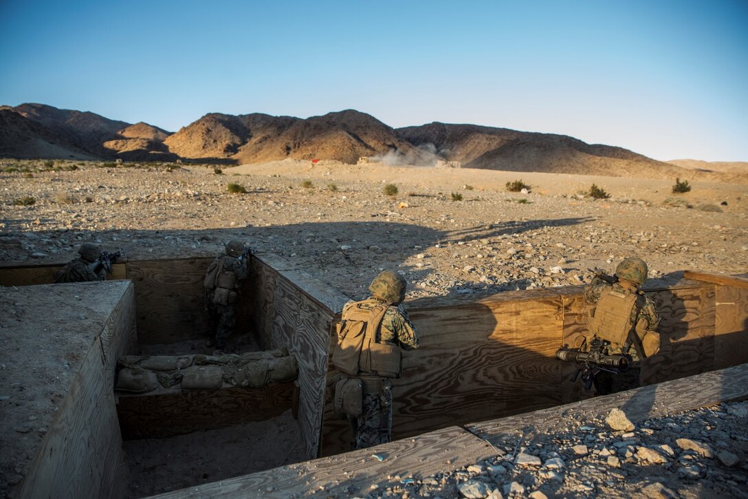 U.S. Marines with Battalion Landing Team 3rd Battalion, 1st Marine Regiment, 15th Marine Expeditionary Unit, engage targets during a combined arms exercise aboard Marine Corps Air Ground Combat Center, Twentynine Palms, Calif., Dec. 13, 2014. BLT 3/1 conducted this training concurrent with the 15th MEU’s realistic urban training.  RUT prepares the 15th MEU’s Marines for their upcoming deployment, enhancing their combat skills in environments similar to those they may find in future missions. (U.S. Marine Corps Photo by Sgt. Emmanuel Ramos/Released)