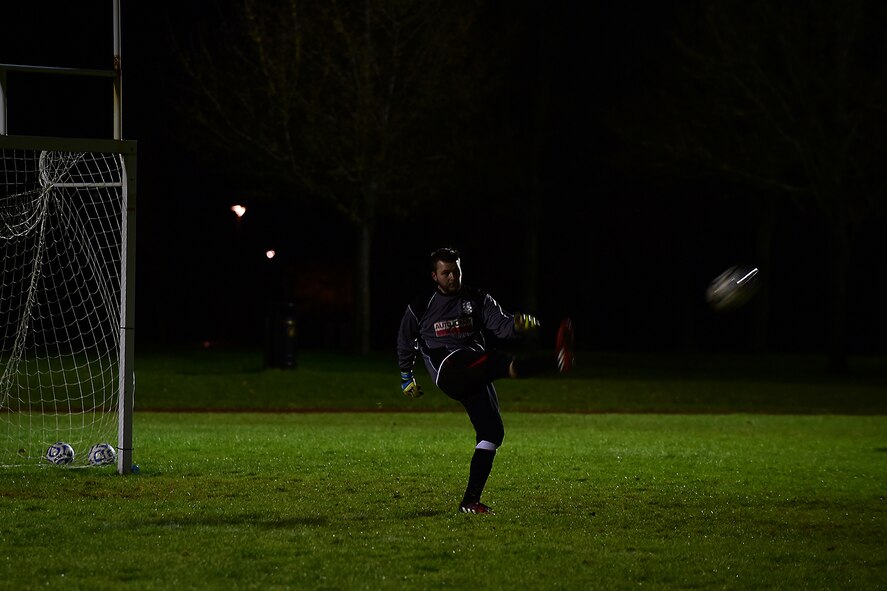 The Banbury Galaxy Football Club goalkeeper takes a goal kick during the game against RAF Croughton Football Club at RAF Croughton, England, Dec. 10, 2014. This was the first time Banbury Galaxy FC has played against an American team. (U.S. Air Force photo by Tech. Sgt. Chrissy Best/Released)