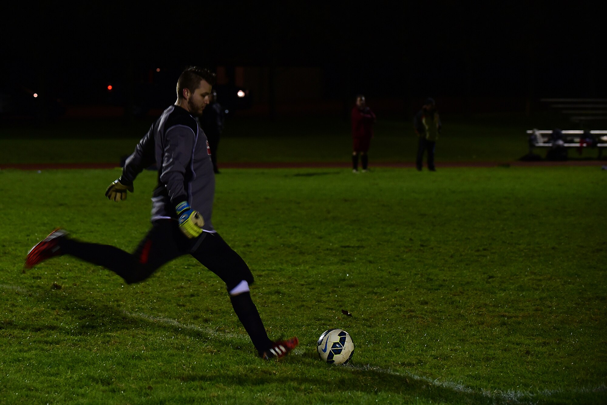 The Banbury Galaxy Football Club goalkeeper takes a goal kick during the game against RAF Croughton Football Club, at RAF Croughton, England, Dec. 10, 2014. The Banbury Galaxy FC, has been playing together for seven years, and this was the first game they played against an American team. (U.S. Air Force photo by Tech. Sgt. Chrissy Best/Released)