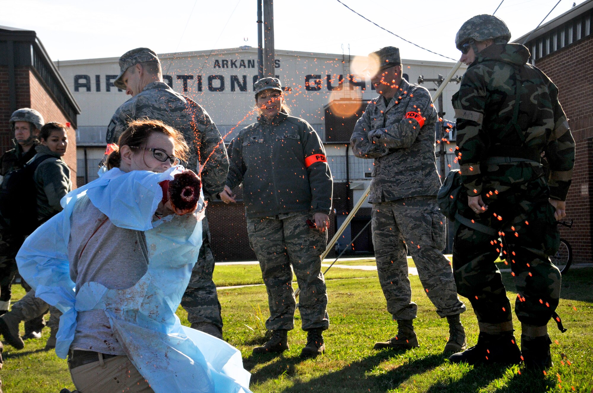 Members of the 188th Wing Student Flight role play as victims of a simulated rocket attack during a mass casualty exercise at Ebbing Air National Guard Base, Fort Smith, Ark., Nov. 2, 2014. The purpose of the exercise was to test Airmen’s ability to triage personnel while facing possible attacks. (U.S. Air National Guard photo by Staff Sgt. John Suleski/released)
