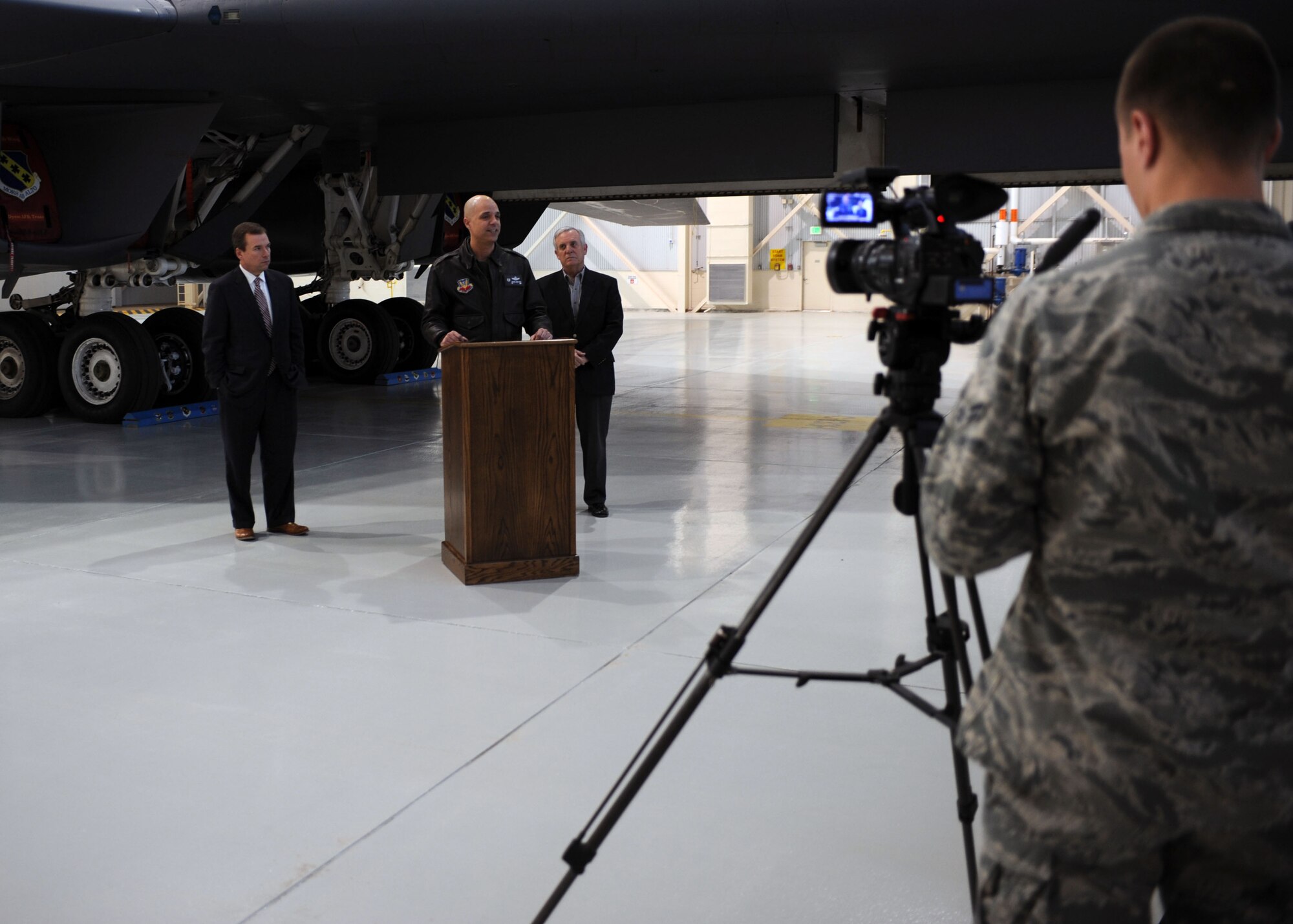 U.S. Air Force Col. Michael Bob Starr, 7th Bomb Wing commander, announces the 2015 Dyess Big Country Airfest during a press conference Dec. 29, 2014, at Dyess Air Force Base, Texas.  Starr teamed up with the Abilene Mayor and Chamber of Commerce to deliver details on plans for the airshow and World’s Largest Barbecue. (U.S. Air Force photo by Senior Airman Shannon Hall/Released)