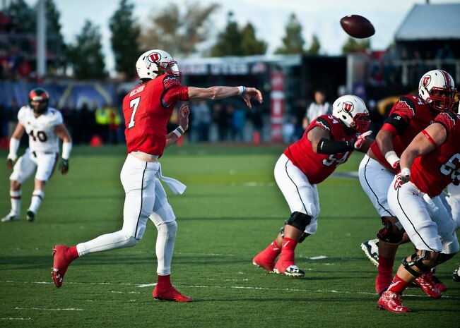 Utah quarterback Travis Wilson throws a pass during the Las Vegas Bowl Dec. 20, 2014. Wilson was named the most valuable player of the game after throwing for 158 yards and a touchdown and adding 91 yards and three touchdowns on the ground. (U.S. Air Force photo by Staff Sgt. Siuta B. Ika)