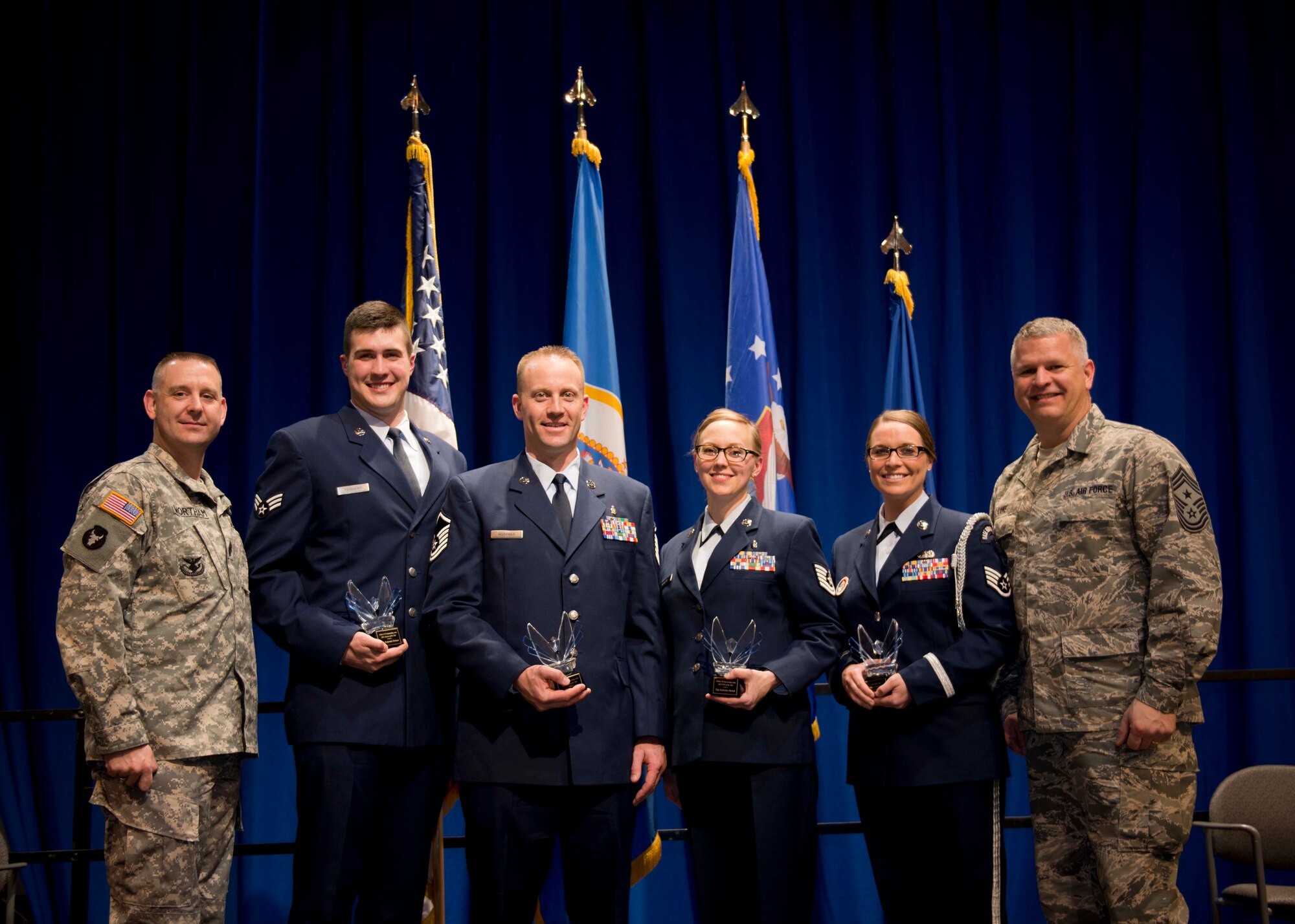 Members of the 133rd partake in a wing-wide awards ceremony to recognize the achievements of 2014.(U.S. Air National Guard Photo By Tech. Sgt. Paul Santikko/Released)