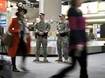 Spc. James Jackson, left, and Sgt. Christopher McClung of the 485th Military Police Company monitor activity in the baggage claim area at McCarran International Airport in Las Vegas on a previous New Year’s Eve while participating in the Vigilant Sentinel exercise. About 200 Nevada Guard Soldiers and Airmen participated in the exercise that coincided with the New Year’s holiday.


