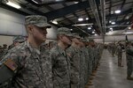 Despite the withdrawal of combat troops from Iraq, Soldiers continue to prepare for operations in other countries to include Afghanistan and the Horn of Africa. Here, troops assigned to Provincial Reconstruction Teams assemble for a departure ceremony at Camp Atterbury Joint Maneuver Training Center as they prepare for an upcoming deployment to Afghanistan.