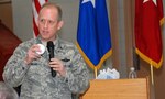 Brig. Gen. Don Dunbar, adjutant general of Wisconsin, uses a baseball to demonstrate the "angle of resilience" during a speech on resilience Friday (Feb. 5) at the Joint Force Headquarters in Madison. Dunbar was the featured speaker during a prayer breakfast.
