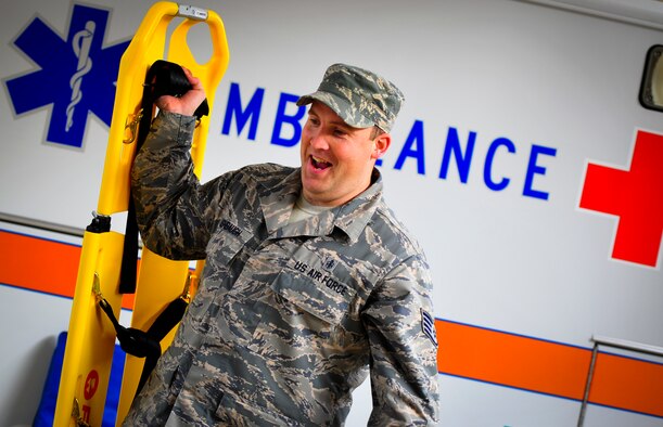 Staff Sgt. Brock Ashbaugh, 1st Special Operations Medical Operations Squadron ambulatory service paramedic, loads equipment onto a new ambulance on Hurlburt Field, Fla., Dec. 30, 2014. The 1st SOMDOS is upgrading their fleet of ambulances for the first time since 2006.  (U.S. Air Force photo/Senior Airman Christopher Callaway) 
