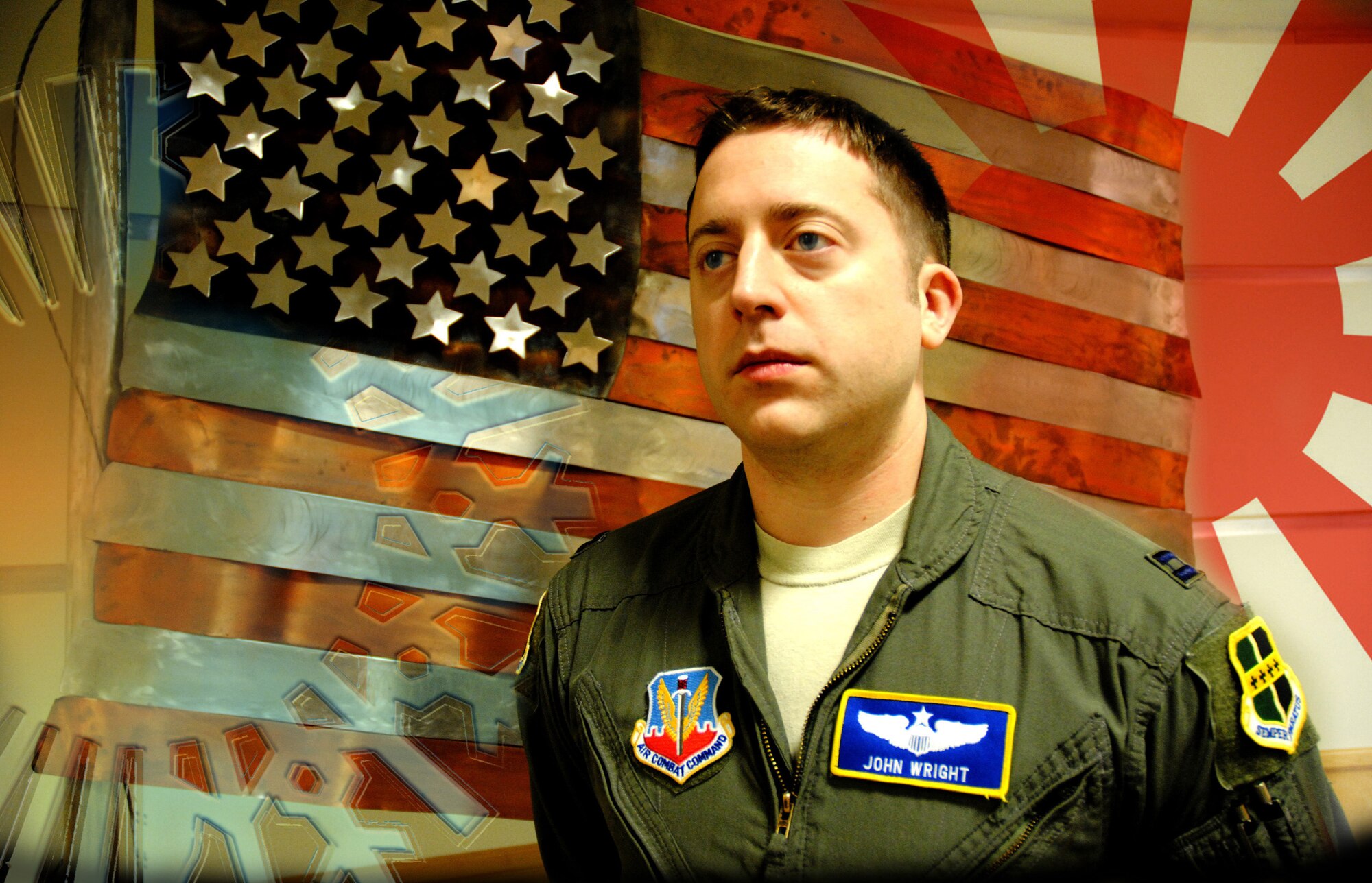 Capt. John Wright poses for a photo Dec. 23, 2014, at Grand Forks Air Force Base, N.D. The nine-year Air Force veteran from the 348th Reconnaissance Squadron was recently selected to be part of the Mansfield Fellowship Program. The Mansfield Fellowship Program was established by the U.S. Congress in 1994 to build a corps of U.S. federal government employees with proficiency in the Japanese language and practical, firsthand knowledge about Japan and its government. (U.S. Air Force photo illustration/Staff Sgt. Luis Loza Gutierrez) 