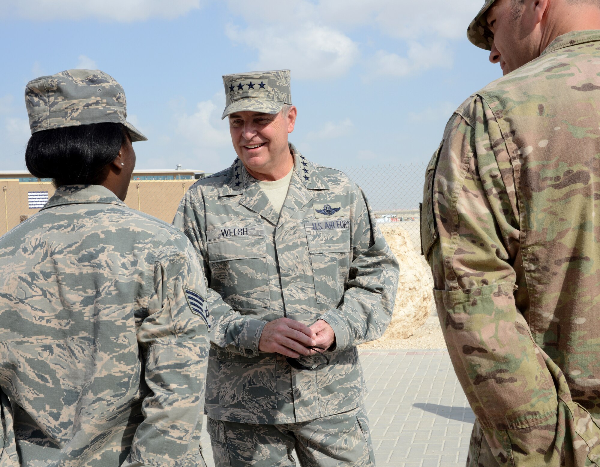 Air Force Chief of Staff Gen. Mark A. Welsh III speaks with Airmen during a base visit, Dec. 14, 2014, at Al Udeid Air Base, Qatar. Welsh met with Airmen to thank them for their service and discuss the sacrifices and challenges experienced while deployed. (U.S. Air Force photo/Senior Airman Kia Atkins)