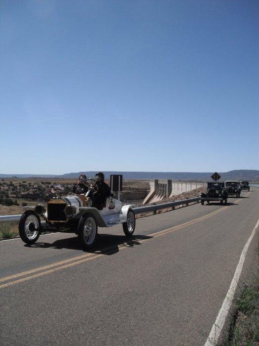 2014 District Photo Drive entry. Photo by Valerie Mavis, May 2, 2014.  “Members of the Tin Lizzies Car Club drive across Conchas Dam during their visit.”