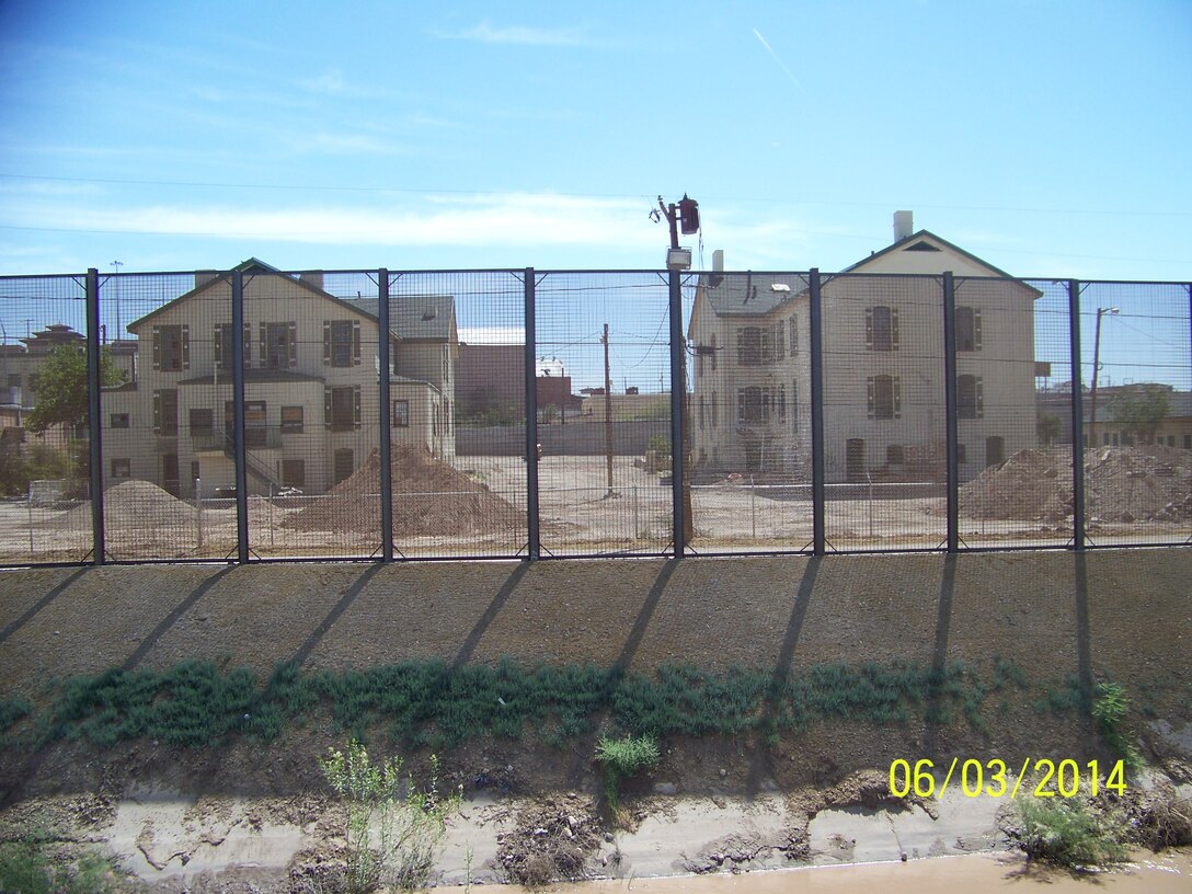 2014 District Photo Drive entry. Photo by Art Aranda, June 3, 2014.  “The Border Fence with the historic Old Ft. Bliss Officers’ Quarters in the background.”