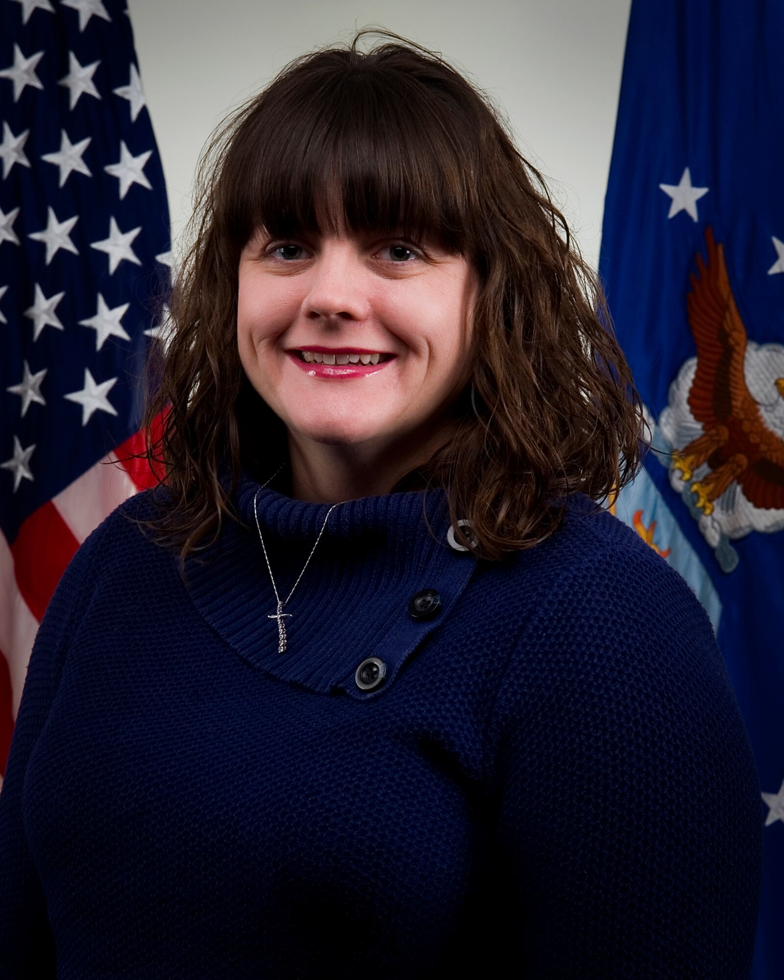 Erin Michael-Jolliff, 434th Air Refueling Wing director of psychological health, poses for a photo at Grissom Air Reserve Base, Ind., Dec. 22, 2014. As director of psychological health, Michael-Jolliff has the responsibility of increasing Grissom's readiness by helping Airmen and their families maximize psychological health, resilience and wellbeing.  (U.S. Air Force photo/Tech. Sgt. Benjamin Mota)
