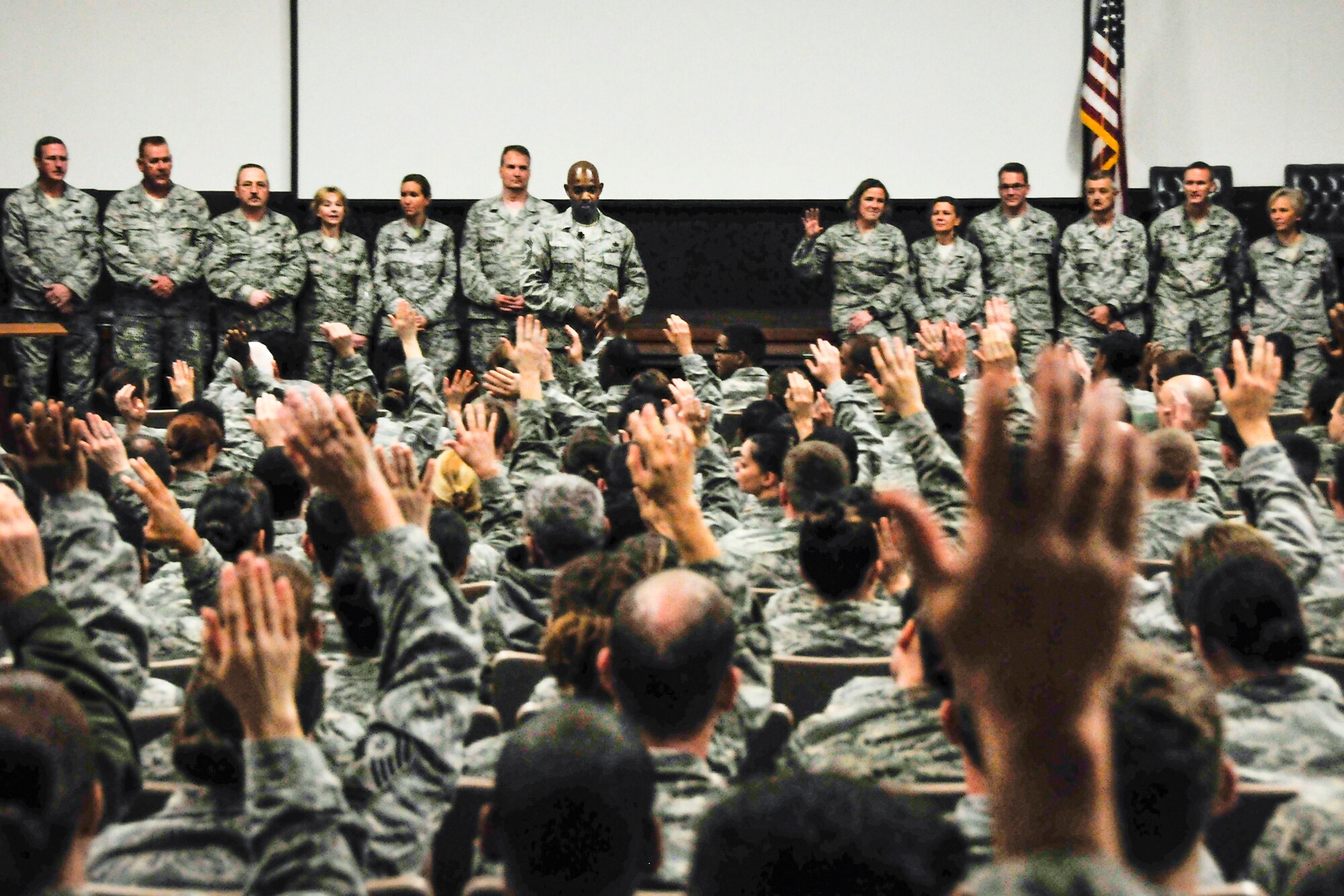 Enlisted Airmen respond to a question from Chief Master Sgt. Cameron Kirksey, the Air Force Reserve Command command chief, during an enlisted call held at Duke Field Feb. 2.  The chief addressed the Airmen on sexual assault issues, core values, senior enlisted leadership, local aircraft restructuring, money, jobs and retraining.  (U.S. Air Force photo/Tech. Sgt. Jasmin Taylor)