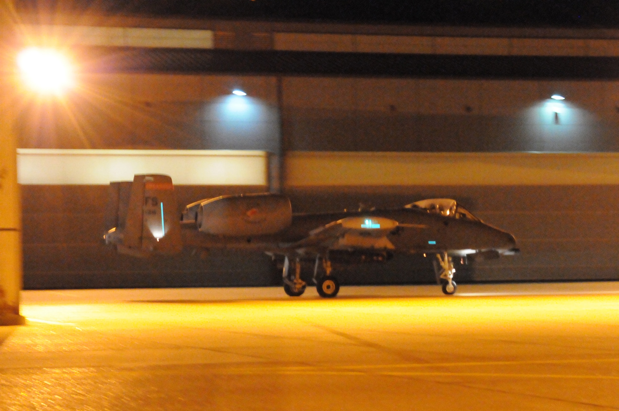 Tail No. 216 taxies on the ramp at the 188th Fighter Wing’s Ebbing Air National Guard Base in Fort Smith, Ark., Jan. 29, 2014. Maj. Patric Coggin (188) and Lt. Col. Toby Brallier (216) conducted the final night-flying mission for the 188th. The two pilots conducted a flight lead upgrade certification near Whiteman Air Force Base, Mo., before returning to the 188th’s Detachment 1 Razorback Range at Fort Chaffee Maneuver Training Center, Ark., to log additional close-air support training.  The wing is currently transitioning from a fighter mission to an Intelligence, Surveillance and Reconnaissance/remotely piloted aircraft (MQ-9 Reaper) mission that will also feature a space-focused targeting squadron. The 188th has divested two A-10C Thunderbolt II “Warthogs” per month since September 2013. The last two Warthogs are slated to leave the 188th in June 2014. The 188th has flown A-10s since April 2007 and has had assigned aircraft on site since 1953. June will mark the first time in the unit’s 60-year history that no assigned military aircraft will be parked on the flightline at Ebbing Air National Guard Base, Fort Smith, Ark. (U.S. Air National Guard photo by Tech Sgt. Josh Lewis)