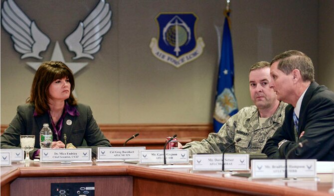 Dr. Mica Endsley speaks with Col. Greg Barnhart and Garry Gagnon during an open discussion Jan. 23, 2014 at Hanscom Air Force Base, Mass. During her visit to the base, Endsley received program briefings at Hanscom AFB and MIT Lincoln Laboratory, learned about development planning work and visited STARBASE, a DOD-initiative to get youth interested in science, technology. Endsley is the chief scientist for the Air Force, Barnhart is Hanscom AFB's deputy associate director for Engineering and Gagnon is the Battle Management engineering director. (U.S. Air Force photo/Walter Santos) 