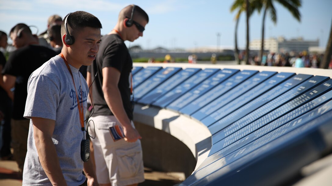 Marines and Sailors from 3rd Marine Aircraft Wing visiting the USS Arizona Memorial and Museum, during a Committed and Engaged Leadership seminar Jan. 24, pause to remember the service members that lost their lives during the attack on Pearl Harbor. This seminar was the third CEL seminar supporting the 3rd MAW commanding general’s Committed and Engaged Leadership initiative.