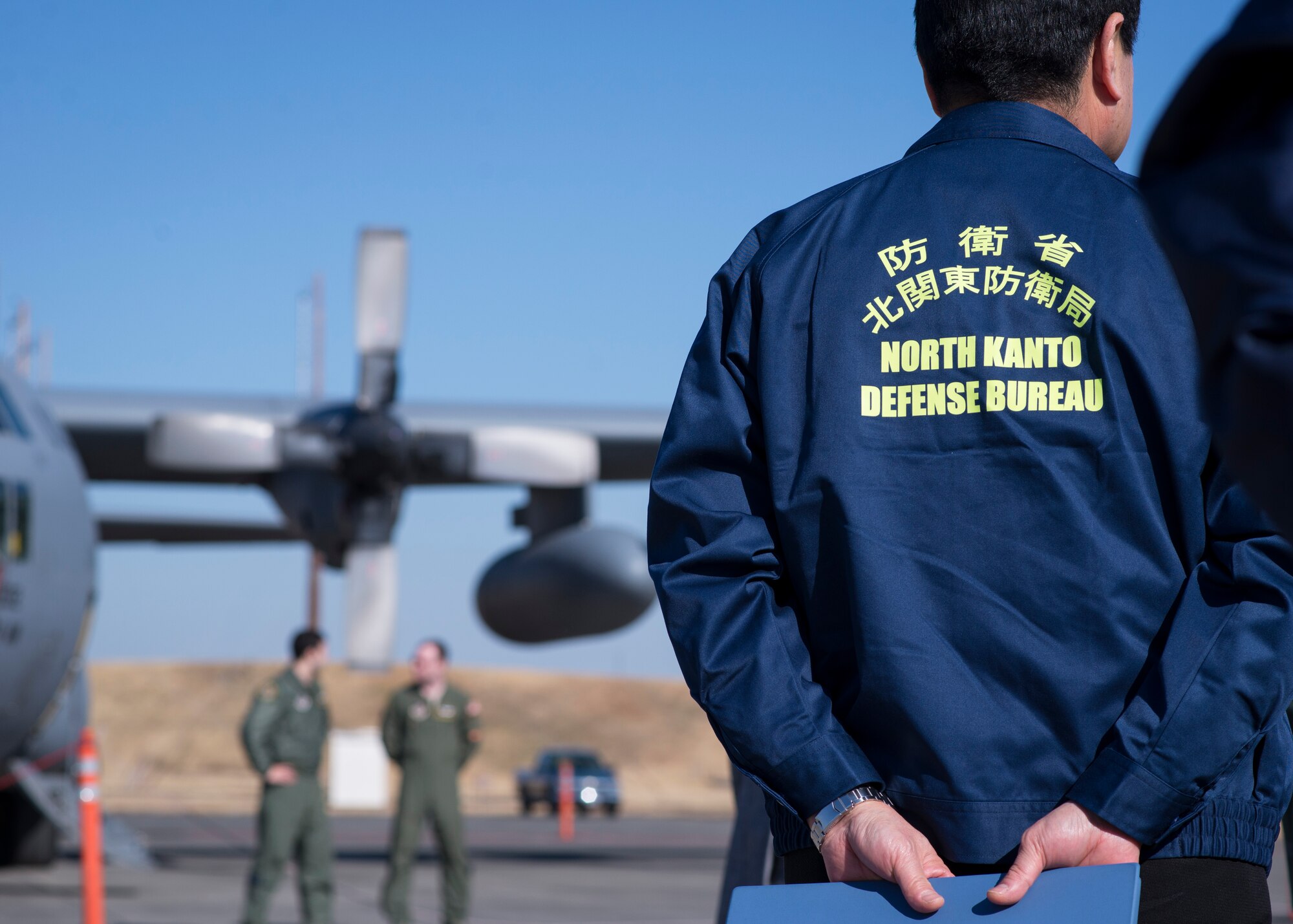 YOKOTA AIR BASE, Japan -- Observers from the North Kanto Defense Bureau learn about Yokota’s C-130H Hercules during a disaster preparedness exercise at Yokota Air Base, Japan, Jan. 31, 2014. Yokota hosted more than 150 local first responders in order to enhance readiness and interoperability between U.S. and Japanese disaster response teams. (U.S. Air Force photo by Capt. Raymond Geoffroy/Released)