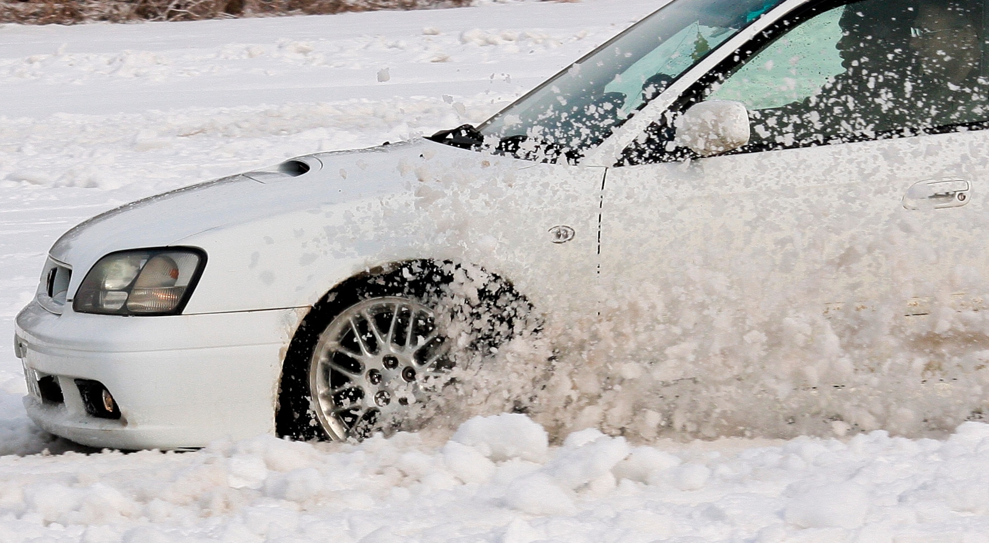 Airmen learned safe winter driving techniques during the Slippery Weasel Driving course at Misawa Air Base, Japan, Jan. 31, 2014. This course allows Misawa Airmen the opportunity to practice driving on slippery roads in a safe location. (U.S. Air Force photo/Tech. Sgt. Logan McKeown)