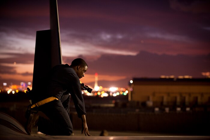 Senior Airmen Oren Hemphill, an F-15E Strike Eagle crew chief, from the 366th Aircraft Maintenance Squadron from Mountain Home Air Force Base, Idaho, performs pre-flight checks before his assigned aircraft heads out for a night training mission during Red Flag 14-1 at Nellis Air Force Base, Nev., Jan. 30, 2014. Flying units from around the Department of Defense deploy to Nellis AFB to participate in Red Flag exercises that are typically held three times a year and organized by the 414th Combat Training Squadron. (U.S. Air Force photo by Airman 1st Class Joshua Kleinholz)
