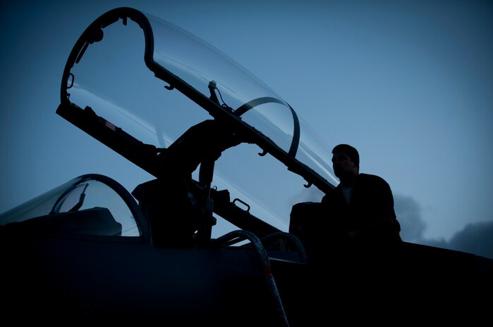 Staff Sgt. Jake Perez, an F-15E Strike Eagle crew chief, from the 366th Aircraft Maintenance Squadron from Mountain Home Air Force Base, Idaho, performs pre-flight checks before his assigned aircraft heads out for a night training mission during Red Flag 14-1 at Nellis AFB, Nev., Jan. 30, 2014. The introduction of low-visibility conditions presents aircrews with a number of challenges that test their ability to perform the mission at any time; day or night.  (U.S. Air Force photo by Airman 1st Class Joshua Kleinholz)